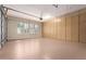 Spacious garage with epoxy floors and built-in cabinets for organized storage at 41715 N River Bend Rd, Phoenix, AZ 85086