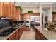 Modern kitchen featuring stainless appliances, sleek countertops, and custom cabinetry at 41715 N River Bend Rd, Phoenix, AZ 85086