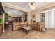 Open-concept living room with views into the kitchen and dining area at 41715 N River Bend Rd, Phoenix, AZ 85086