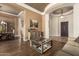 Open living room with hardwood floors, stylish furniture, and ample natural light at 41715 N River Bend Rd, Phoenix, AZ 85086