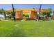 Outdoor community amphitheater nestled on a green lawn with shade structures at 4865 S Cylinder Way, Mesa, AZ 85212