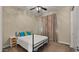 Bedroom with a bed, a ceiling fan, and a view of the outside at 4865 S Cylinder Way, Mesa, AZ 85212