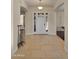 Bright and open foyer with tile flooring and elegant lighting at 4865 S Cylinder Way, Mesa, AZ 85212