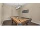 Relaxing game room featuring a classic billiard table and stylish lighting at 4865 S Cylinder Way, Mesa, AZ 85212