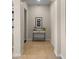 Clean hallway with artwork and minimalist decor at 4865 S Cylinder Way, Mesa, AZ 85212