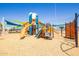 Colorful community playground featuring slides, climbing structures, and shaded areas at 4865 S Cylinder Way, Mesa, AZ 85212