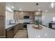 Modern kitchen featuring sleek countertops, updated appliances, and stylish fixtures at 6502 E Rustic Dr, Mesa, AZ 85215