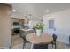Eat in kitchen features stainless appliances and a stylish island with seating at 6502 E Rustic Dr, Mesa, AZ 85215