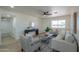 Well-lit living room showcasing modern decor, open space, and hardwood flooring at 6502 E Rustic Dr, Mesa, AZ 85215