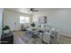 Comfortable living room featuring plush seating, contemporary decor, and plenty of natural light at 6502 E Rustic Dr, Mesa, AZ 85215