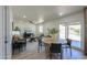 Bright, open-concept living room features modern finishes and access to outdoor space at 6502 E Rustic Dr, Mesa, AZ 85215