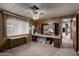 Bedroom with a fan and work area, providing a versatile and functional space at 661 S Hawes Rd # 81, Mesa, AZ 85208