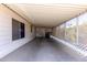 Covered carport showing ample parking space and partial privacy screening at 661 S Hawes Rd # 81, Mesa, AZ 85208