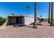 Single-story home features desert landscaping, a covered patio, and an outdoor grill for easy entertaining at 661 S Hawes Rd # 81, Mesa, AZ 85208