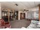 Inviting living room with ample seating, featuring archways that lead to other rooms in the home at 661 S Hawes Rd # 81, Mesa, AZ 85208