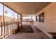 Cozy covered patio with a seating area and a view of the neighborhood at 661 S Hawes Rd # 81, Mesa, AZ 85208