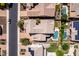 Aerial view of homes featuring a pool, patio, landscaping, and desert landscaping at 882 E Parkview Dr, Gilbert, AZ 85295