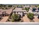 Wide aerial shot of a neighborhood showcasing the beautiful desert landscaping and tile roofs at 882 E Parkview Dr, Gilbert, AZ 85295