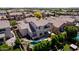 A backyard with a pool, manicured lawn, patio, and desert landscaping at 882 E Parkview Dr, Gilbert, AZ 85295