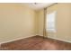 Bedroom featuring hardwood floors, neutral walls, and natural lighting at 882 E Parkview Dr, Gilbert, AZ 85295