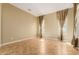 Empty bedroom showcasing neutral walls and tile flooring at 882 E Parkview Dr, Gilbert, AZ 85295