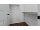 Bright closet features shelving and hardwood floors at 882 E Parkview Dr, Gilbert, AZ 85295