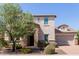 Charming two-story home with stone accents and a welcoming front yard at 882 E Parkview Dr, Gilbert, AZ 85295
