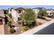 Inviting home with mature trees, landscaped front yard, and a paver driveway at 882 E Parkview Dr, Gilbert, AZ 85295