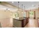 Bright, open kitchen with a large island and seamless flow to the dining area at 882 E Parkview Dr, Gilbert, AZ 85295