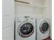 Convenient laundry room is equipped with a Whirlpool washer and dryer at 882 E Parkview Dr, Gilbert, AZ 85295