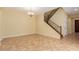 Inviting living space with staircase, tile flooring, and neutral tones for versatile decorating at 882 E Parkview Dr, Gilbert, AZ 85295