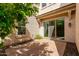 Covered patio area with brick pavers provides an outdoor seating area at 882 E Parkview Dr, Gilbert, AZ 85295