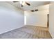 Unfurnished bedroom with neutral walls, a ceiling fan, and plush carpeting at 15387 W Columbine Dr, Surprise, AZ 85379