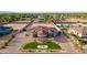 Wide aerial shot showcasing the home's spacious lot, landscaping, and circular driveway in a residential neighborhood at 16368 W Watkins St, Goodyear, AZ 85338