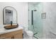 Modern bathroom featuring a glass shower, unique sink, and updated fixtures at 16368 W Watkins St, Goodyear, AZ 85338