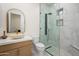 Bathroom featuring vessel sink, white countertops, unique shower with marble accent wall at 16368 W Watkins St, Goodyear, AZ 85338