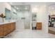 Spacious bathroom with double sinks, glass shower, and vanity area at 16368 W Watkins St, Goodyear, AZ 85338