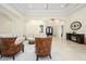 Welcoming foyer with a decorative double door, chandelier, and tiled floors extending into the home at 16368 W Watkins St, Goodyear, AZ 85338