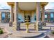 Elegant front entrance featuring grand pillars, an ornate fountain, and a welcoming design at 16368 W Watkins St, Goodyear, AZ 85338