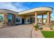 An attractive home boasting a circular driveway, covered entry, and manicured landscaping at 16368 W Watkins St, Goodyear, AZ 85338