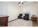Seating area highlighting two leather chairs and a window at 16368 W Watkins St, Goodyear, AZ 85338