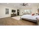 Bright primary bedroom boasts wood floors, recessed lights, and bay window at 16368 W Watkins St, Goodyear, AZ 85338