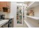 Convenient pantry with built-in shelving and ample storage space at 16368 W Watkins St, Goodyear, AZ 85338
