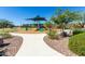 Community playground with slides, climbing structures, and a seating area at 18129 N 65Th Pl, Phoenix, AZ 85054