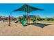Community playground with slides and climbing structures at 18129 N 65Th Pl, Phoenix, AZ 85054