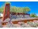 Paradise Ridge community sign surrounded by desert landscaping at 18129 N 65Th Pl, Phoenix, AZ 85054