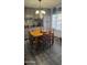 Dining room area features a chandelier, dining table set, and natural light at 2511 N 56Th St, Mesa, AZ 85215