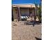 Relaxing porch swing with decorative pillows and landscaping at 2511 N 56Th St, Mesa, AZ 85215