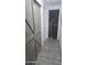 Hallway with barn door and rustic design elements at 2511 N 56Th St, Mesa, AZ 85215