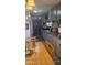 Bright kitchen with light gray cabinets, granite countertops, and an inviting dining area at 2511 N 56Th St, Mesa, AZ 85215